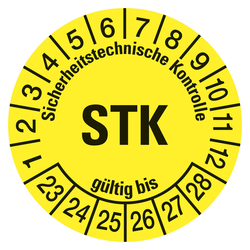 Prüfplaketten gelb Ø 30 mm "STK Sicherheitstechnische Kontrolle" aus PVC-Folie 10 Stück/Bogen